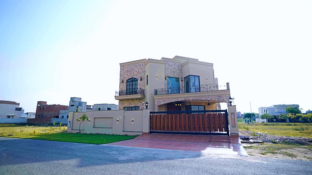 1 Kanal Designer House in DHA Phase 7 | Stone Exterior, Full Basement & Double Lawns