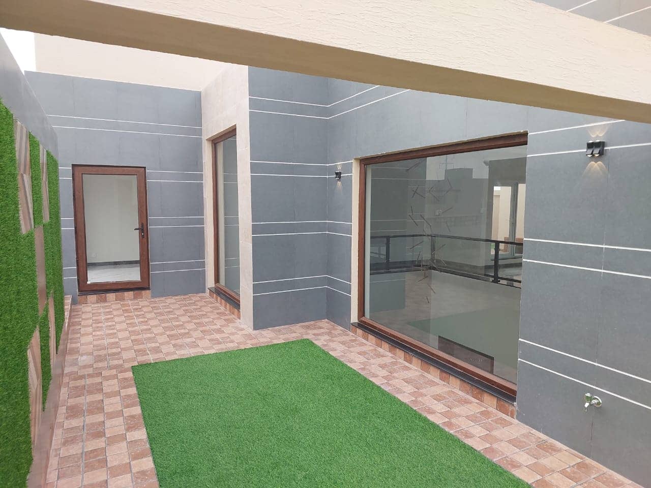 Brand New 1 Kanal Semi-Furnished House for Sale in DHA Phase 7– 5 Beds, 2 Kitchens, Lawn, CCTV 16