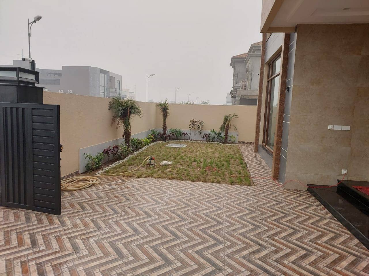 Brand New 1 Kanal Semi-Furnished House for Sale in DHA Phase 7– 5 Beds, 2 Kitchens, Lawn, CCTV 4