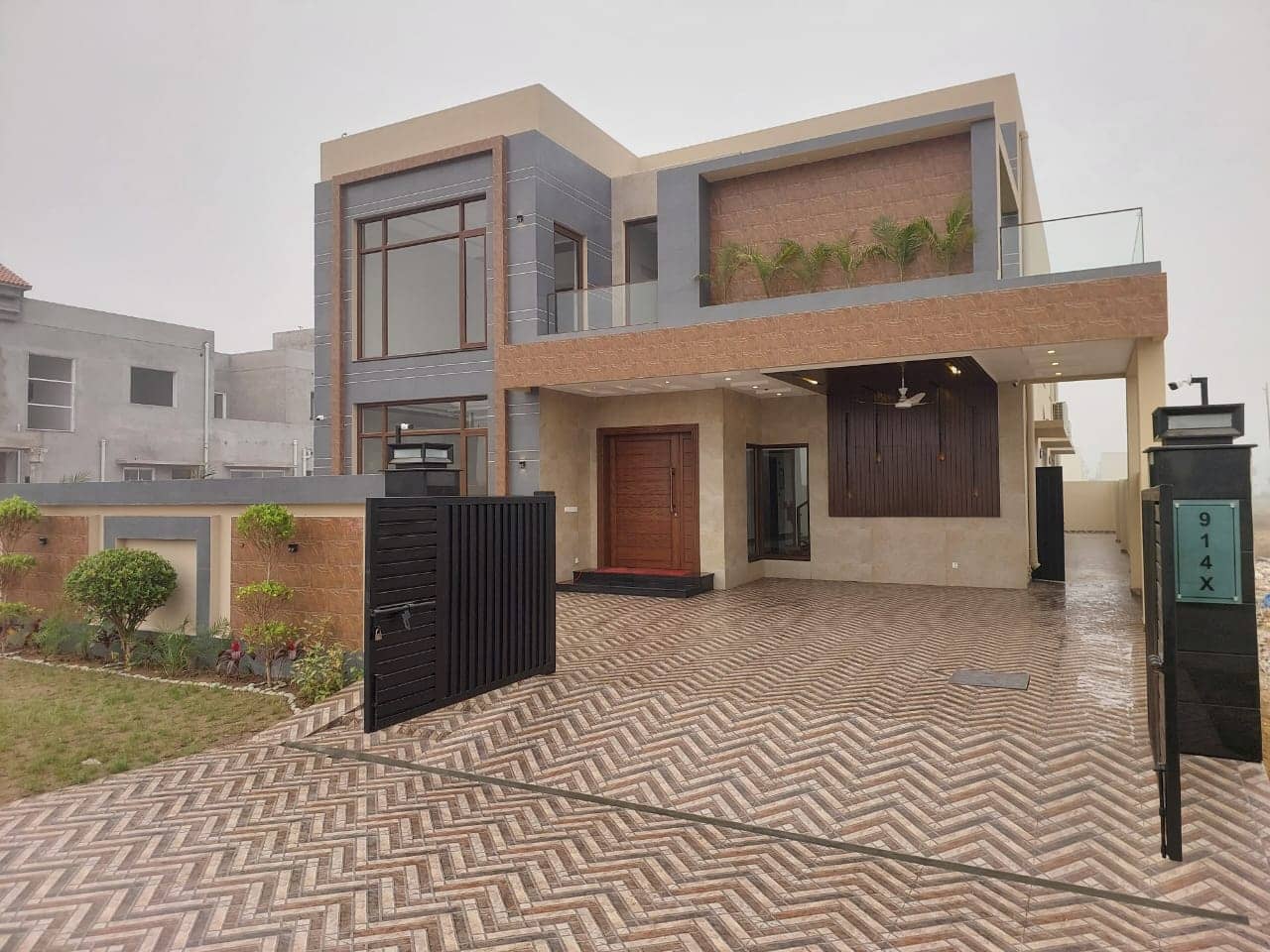 Brand New 1 Kanal Semi-Furnished House for Sale in DHA Phase 7– 5 Beds, 2 Kitchens, Lawn, CCTV 3