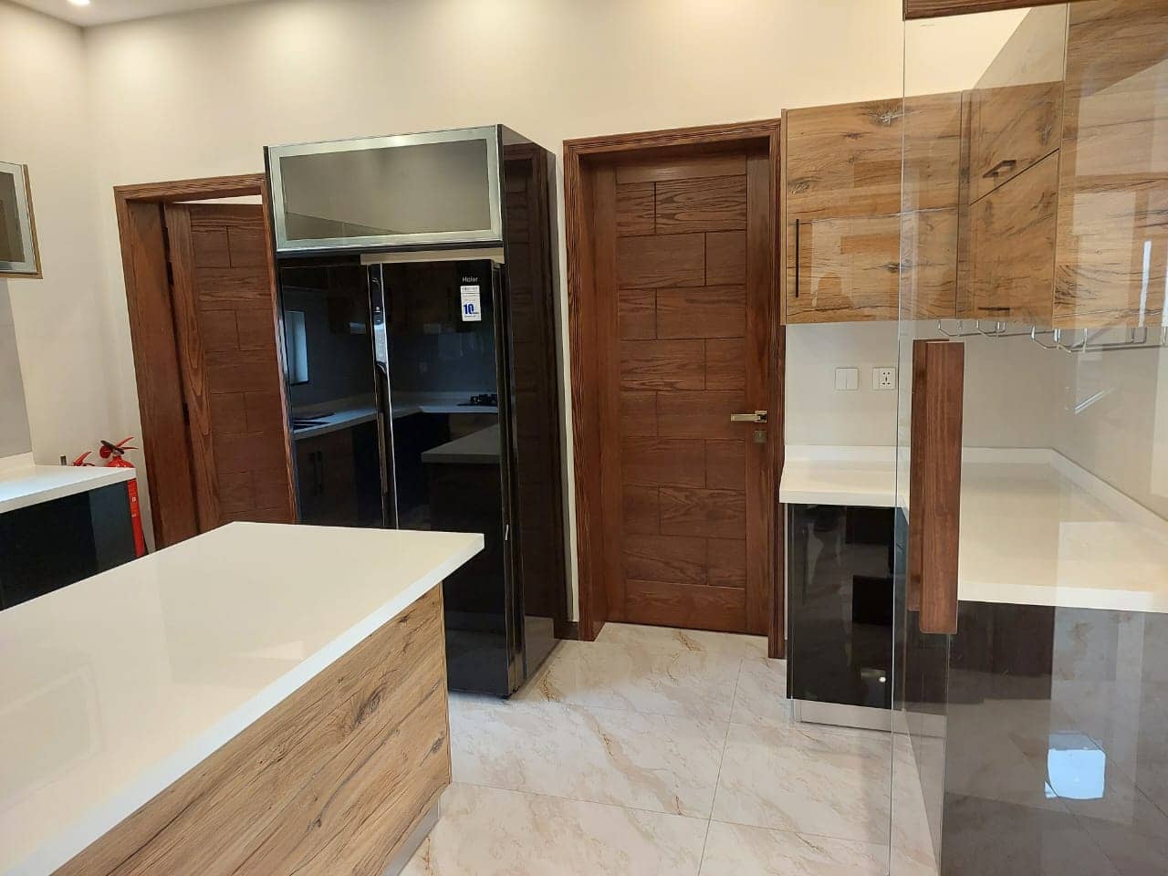 Brand New 1 Kanal Semi-Furnished House for Sale in DHA Phase 7– 5 Beds, 2 Kitchens, Lawn, CCTV 14