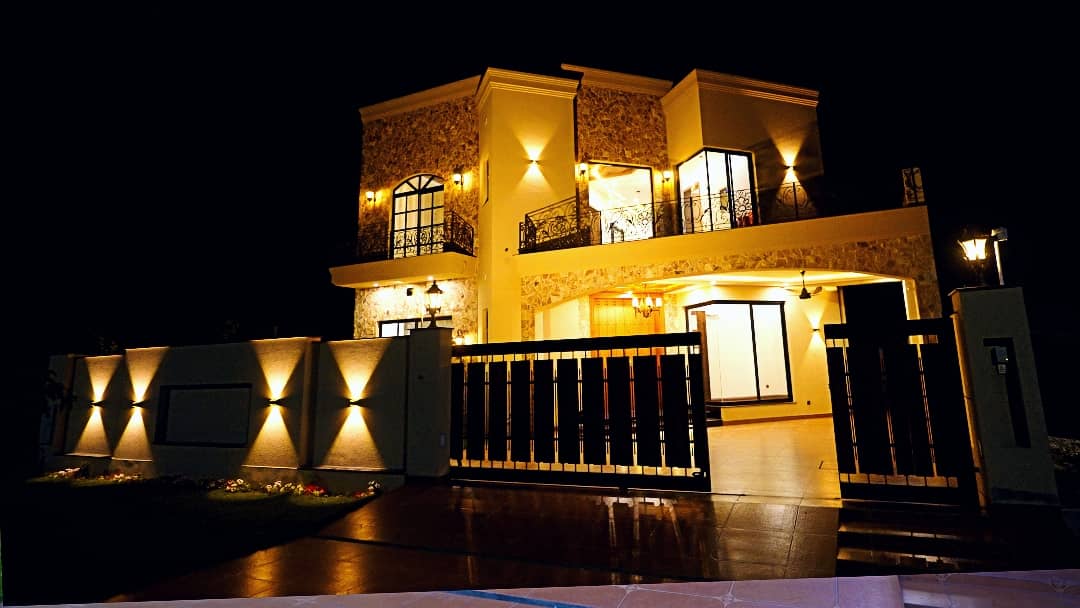 1 Kanal Designer House in DHA Phase 7 | Stone Exterior, Full Basement & Double Lawns 3