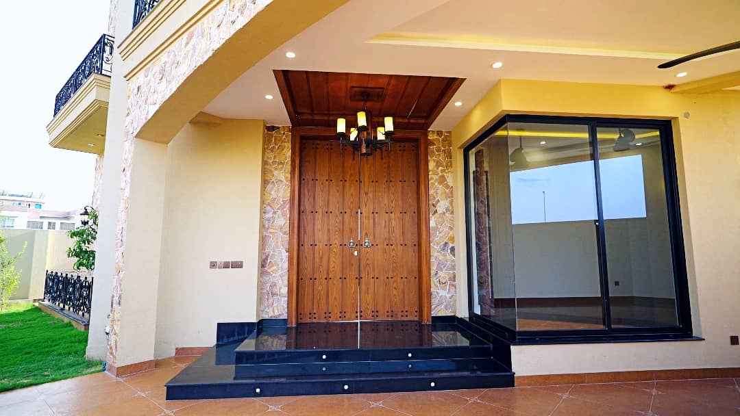 1 Kanal Designer House in DHA Phase 7 | Stone Exterior, Full Basement & Double Lawns 5