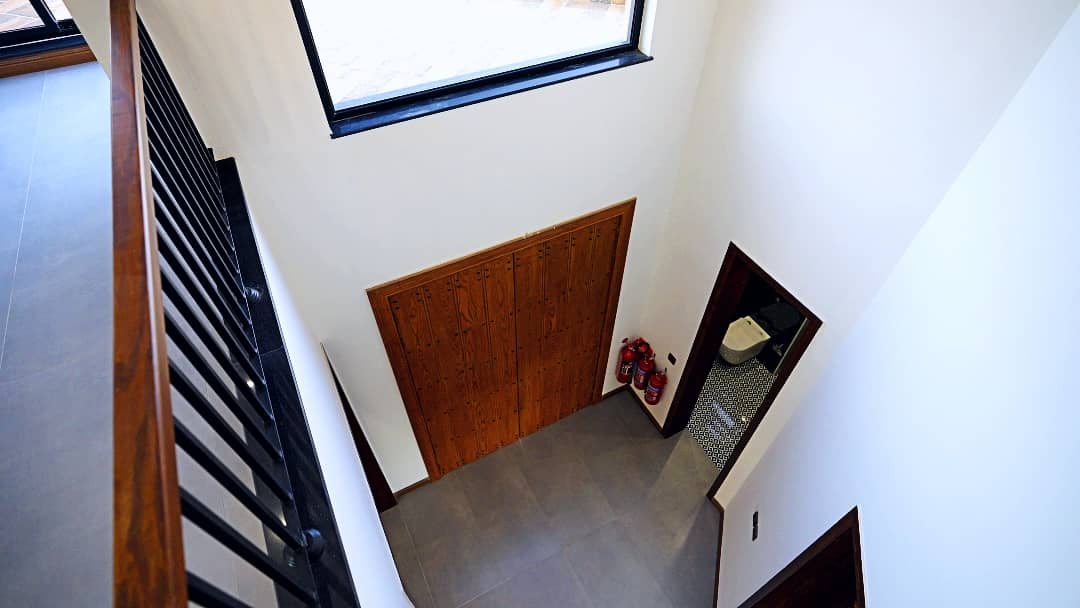 1 Kanal Designer House in DHA Phase 7 | Stone Exterior, Full Basement & Double Lawns 6