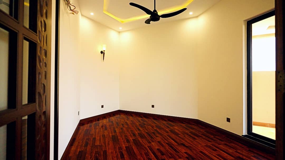 1 Kanal Designer House in DHA Phase 7 | Stone Exterior, Full Basement & Double Lawns 8