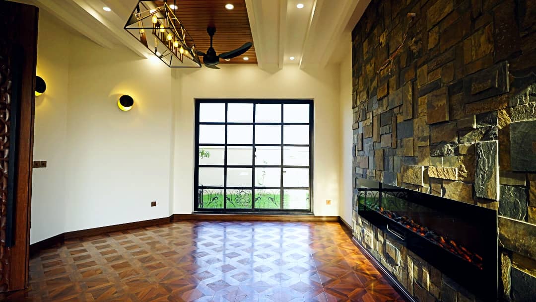 1 Kanal Designer House in DHA Phase 7 | Stone Exterior, Full Basement & Double Lawns 10