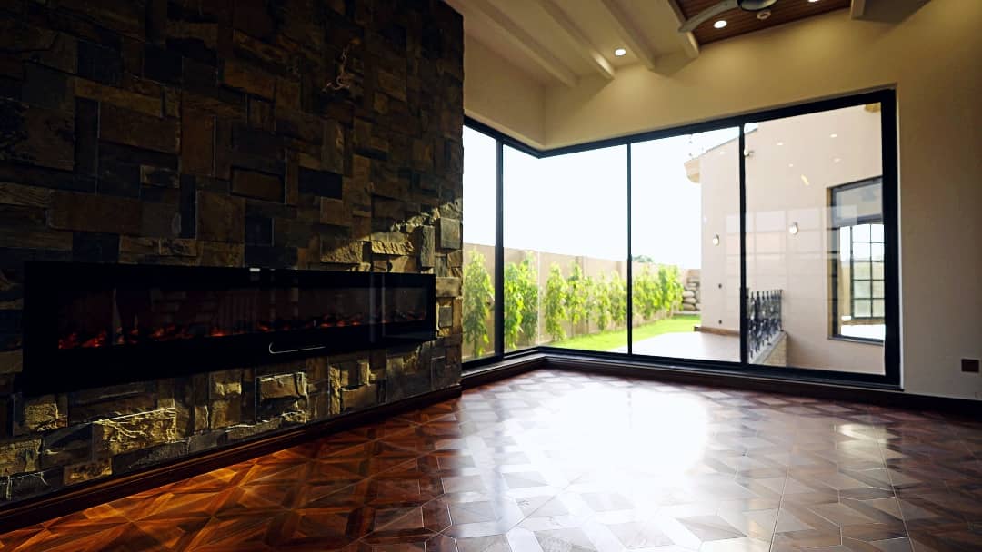 1 Kanal Designer House in DHA Phase 7 | Stone Exterior, Full Basement & Double Lawns 11