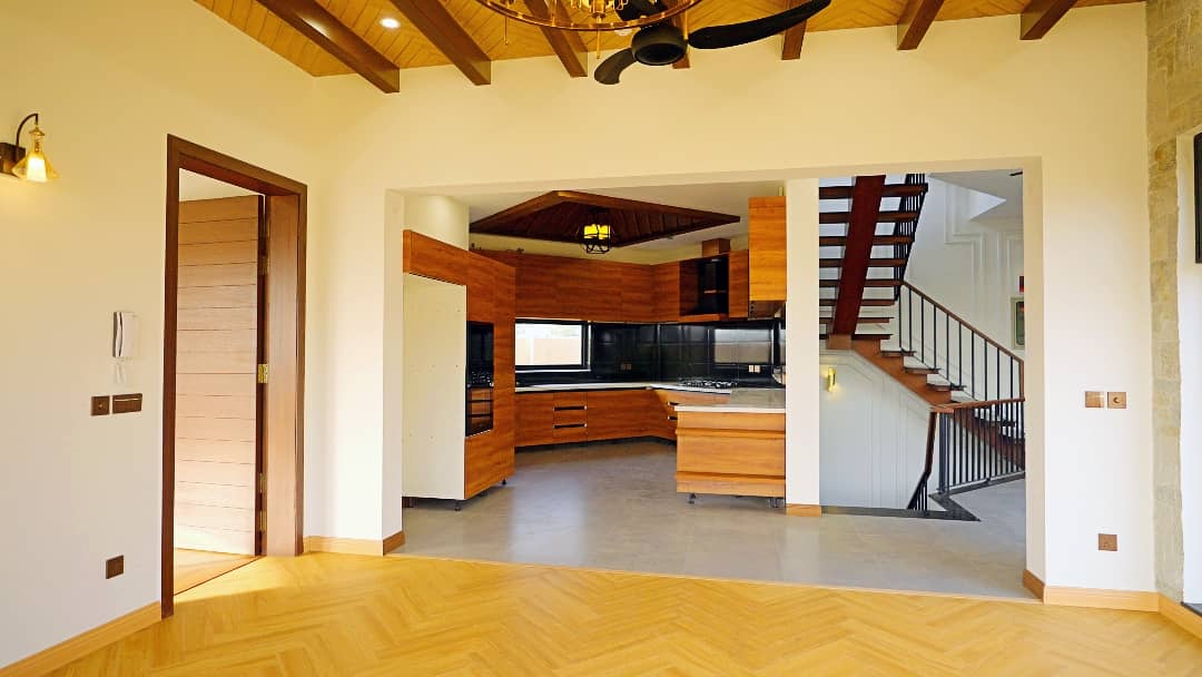 1 Kanal Designer House in DHA Phase 7 | Stone Exterior, Full Basement & Double Lawns 18