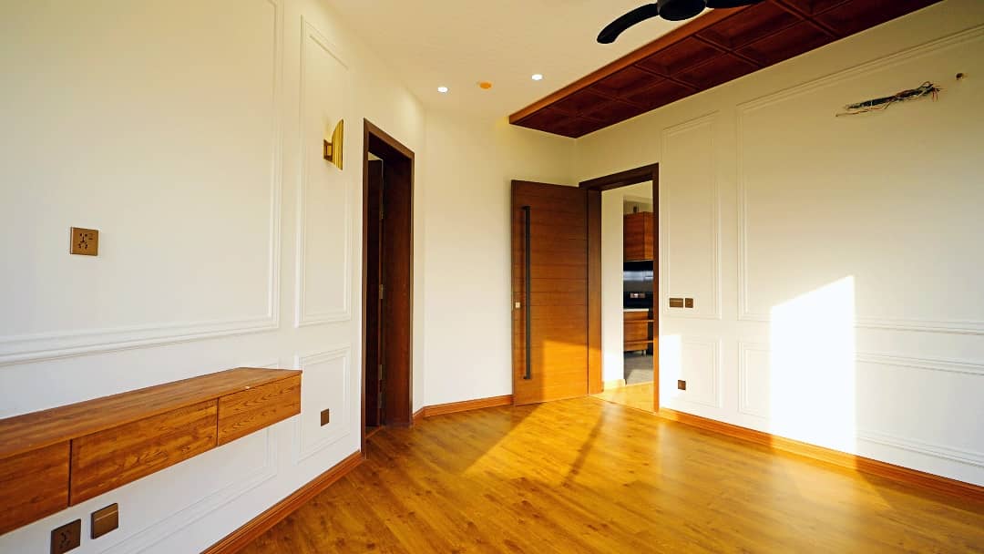 1 Kanal Designer House in DHA Phase 7 | Stone Exterior, Full Basement & Double Lawns 22