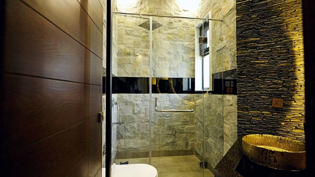 1 Kanal Designer House in DHA Phase 7 | Stone Exterior, Full Basement & Double Lawns 26