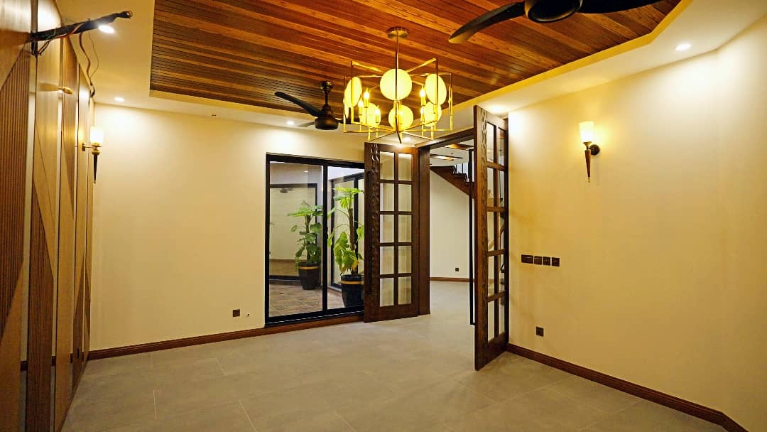 1 Kanal Designer House in DHA Phase 7 | Stone Exterior, Full Basement & Double Lawns 36