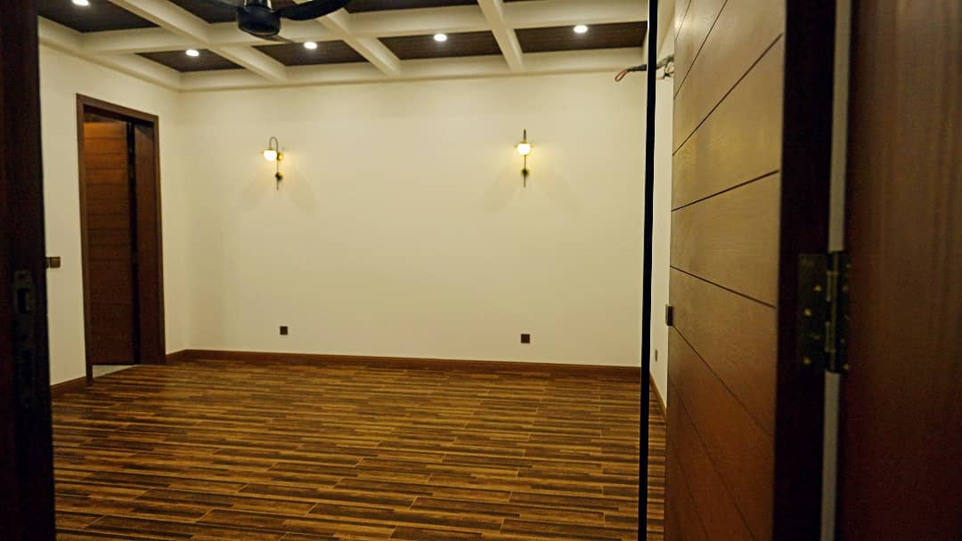 1 Kanal Designer House in DHA Phase 7 | Stone Exterior, Full Basement & Double Lawns 39