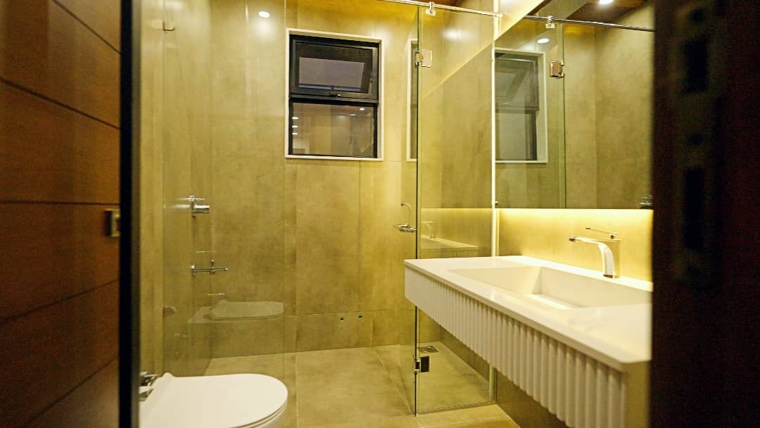 1 Kanal Designer House in DHA Phase 7 | Stone Exterior, Full Basement & Double Lawns 46