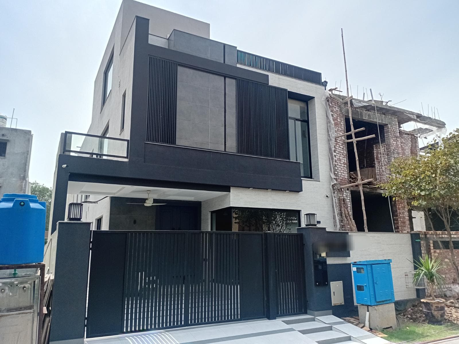10 Marla Brand New House for sale in Lake City, Lahore | TL-2297 Slide 1